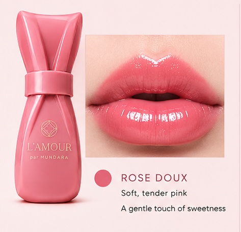 L’AMOUR par MUNDARA Rose Doux lip tint bottle beside glossy lips in soft tender pink